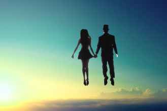 man and woman floating on sky